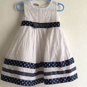 White formal dress with polka dot details